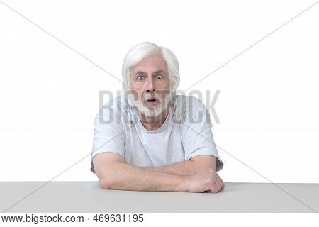 Surprised Old Man With Arms Crossed Isolated On White