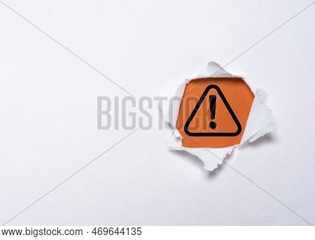 Triangle Caution Warning Sign On Red Background Inside F Punched Paper For Notification Error And Ne