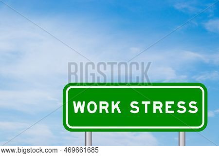 Green Color Transportation Sign With Word Work Stress On Blue Sky With White Cloud Background