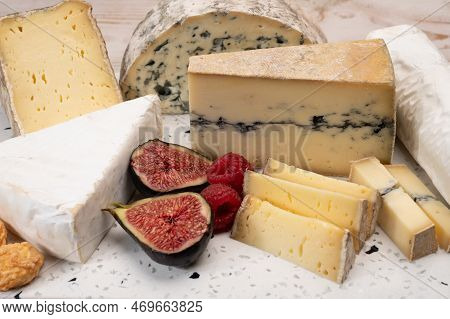 Cheese Collection, Marble Board With French Cheeses Brie, Tomme, Matured Goat Cheese, Morbier  Serve