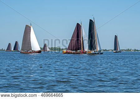 Traditional Frisian Wooden Sailing Ships In A Yearly Competition In The Netherlands