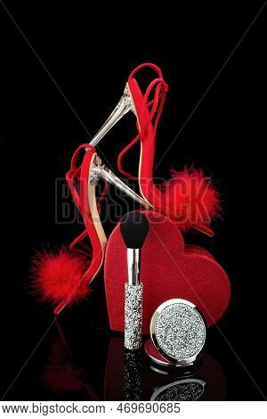 Sexy, Red Strappy High Heel Shoes With Box On A Black Background