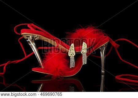 Sexy, Red Strappy High Heel Shoes With Box On A Black Background