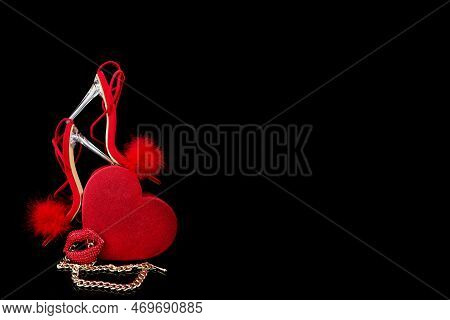 Sexy, Red Strappy High Heel Shoes With Box On A Black Background