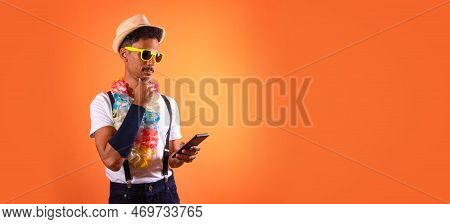 Carnival Brazilian Outfit. Black Man With Carnival Costume Holding Mobile