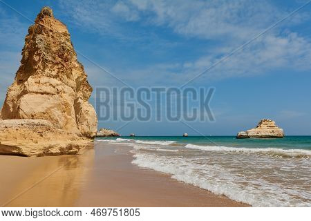Praia Dos Tres Castelos During The Sunny Day. Town Portimao In Algarve Region, Portugal