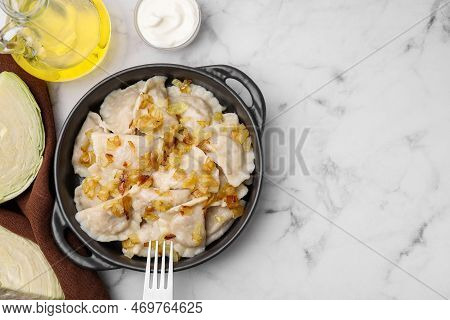 Cooked Dumplings (varenyky) With Tasty Filling And Fried Onions On White Marble Table, Flat Lay. Spa