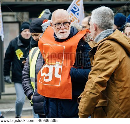 Strasbourg, France - 31 January 2023: Man With Cgt Banner Clothes On Him Talking At Second Demonstra