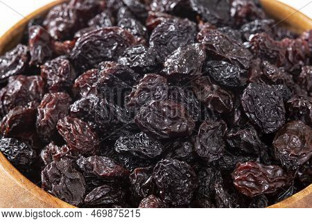 Healthy Food - Nuts Dehydrated Grapes; Photo White Background