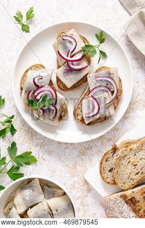 Herring Sandwich. Open Sandwiches With Whole Grain Bread, Herring And Onion. Top View