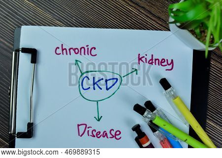 Concept Of Ckd - Chronic Kidney Disease Write On Paperwork Isolated On Wooden Table.
