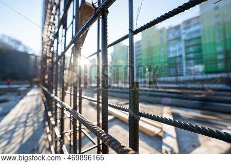 Tied Iron Rebar Close Up. Reinforcing Bar Is Binded Before The Concreting On The Construction Site. 