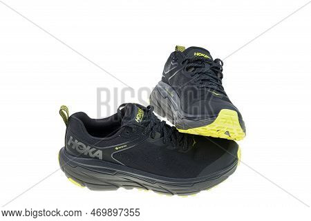 Close-up View Of Black Yellow Hoka Sneakers Isolated On White Background. Sweden. Uppsala. 02.02.202