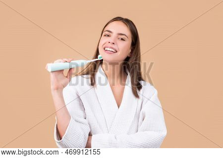 Young Woman Brushing Teeth. Happy Funny Girl Brush Her Teeth On Isolated Background. Beautiful Wide 