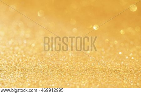 Christmas Golden Bright Glowlight Shine Effect Glitter Texture Blurred Bokeh Abstract  Background.ho