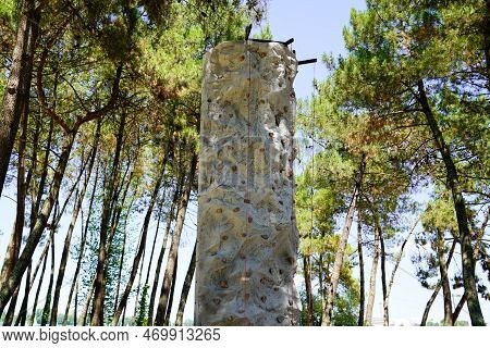 Artificial Plastic Rock Climbing Outdoors On Factitious Wall