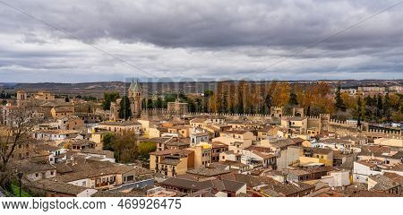 Toledo, Spain - Dec 01, 2022: View Of The Old City From The Alcazar, Royal Palace Over The Tagus Riv