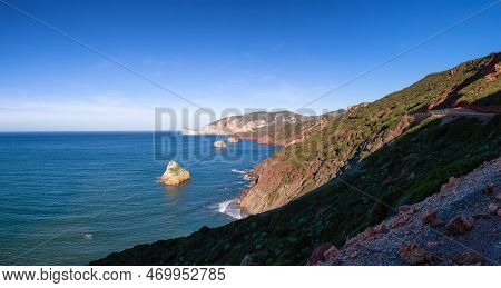 Rocky Cliffs On The Sea Coast. Sardinia, Italy. Nature Background Panorama