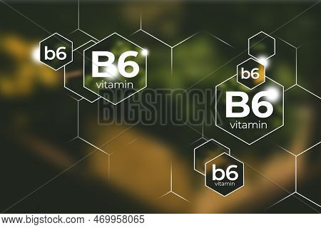 Molecular Model Of Vitamin B6. Hexagons With Vitamin B6 Name, Blurry Background.