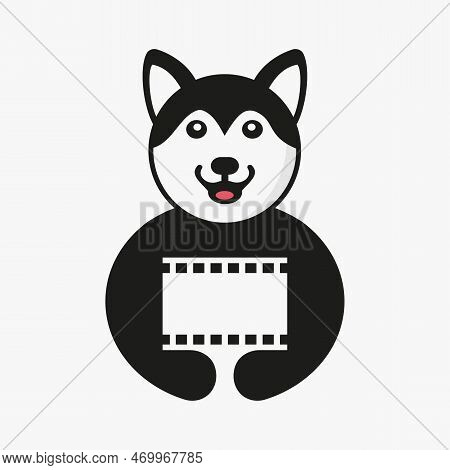 Husky Film Reel Logo Negative Space Concept Vector Template. Husky Holding Movie Reel Symbol