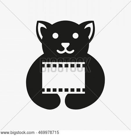 Dog Movie Film Reel Logo Negative Space Concept Vector Template. Dog Holding Film Reel Symbol