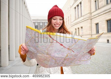 Redhead Girl, Tourist Explores City, Looks At Paper Map To Find Way For Historical Landmarks, Woman 
