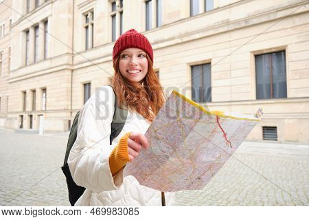 Redhead Girl, Tourist Explores City, Looks At Paper Map To Find Way For Historical Landmarks, Woman 