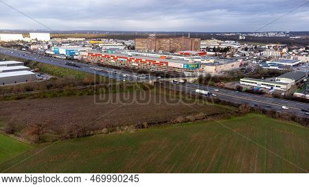 Weiterstadt, Germany February 02 2023: View Over The Commercial Area Of Weiterstadt To The Shopping 