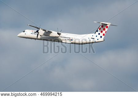 Zurich, Switzerland, January 20, 2023 Croatia Airlines Bombardier Dash 8-q402 Propeller Plane Taking
