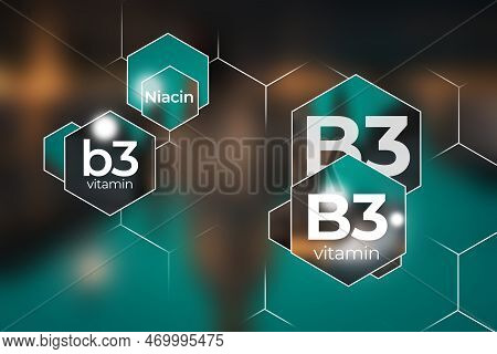 Molecular Model Of Vitamin B3, Niacin. Hexagons With Vitamin B3 Name, Blurry Background.