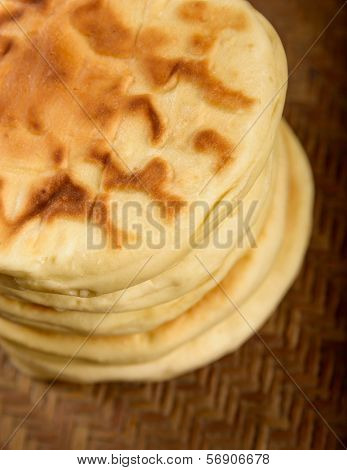 Nepalese bread on wooden background