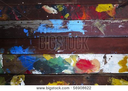 A multicolored wooden wall as a background