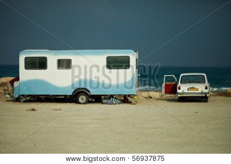 Old caravan and car