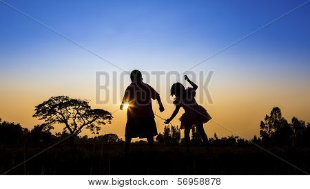Happy kids playing on summertime