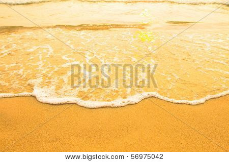 Soft wave of the sea, beach sand texture.
