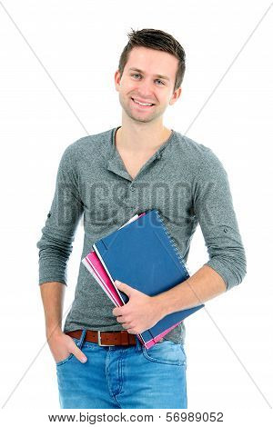 Smiling Teenager With Schoolbooks And Hand In Pocket
