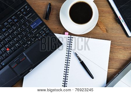 Notebook And Cup Of Coffee