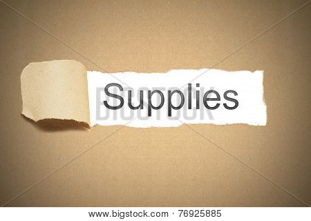 Brown Package Paper Torn To Reveal Supplies