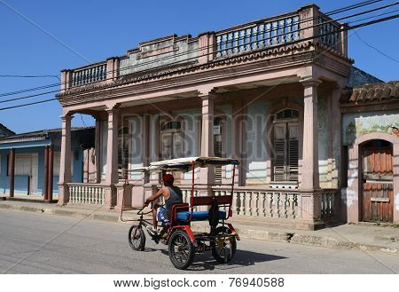 Rickshaw-style tricycle taxi in Baracoa, Cuba