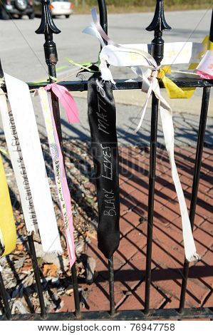 FERGUSON, MO/USA - NOVEMBER 25, 2014: Messages of hope wave in front of business district in Ferguson in the aftermath of riots and vandalism