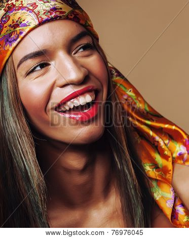 beauty young happy afro american woman in shawl on head