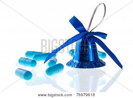 Blue Pills And Decorative Bell