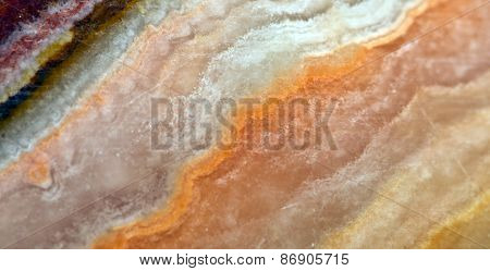 Onyx is banded variety of chalcedony , chemical composition SiO2