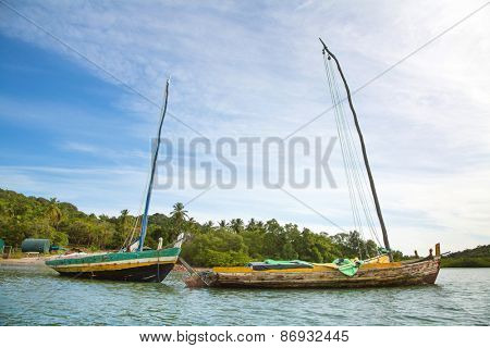 Sail boat in the amazon of brazil: Rain forest near Salvador in the Bahia de Todos. Landscape with a traditional handmade boat of wood.