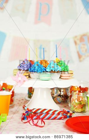 Prepared birthday table with sweets for children party