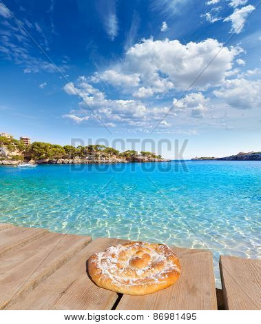 Majorca Porto Cristo beach in Manacor of Mallorca Balearic island ensaimada photo mount
