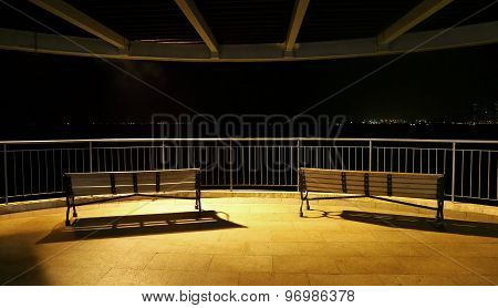 Park benches with spot light at night