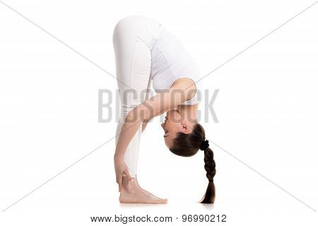 Yogi Female Standing In Intense Forward-bending Pose