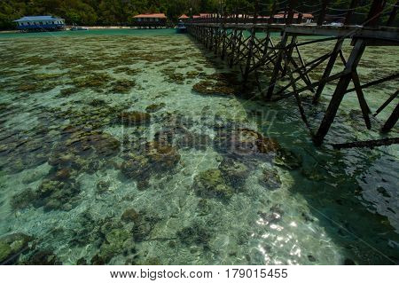 Beautiful tropical Bohey Dulang island with beach and blue water for relax