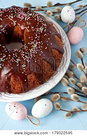 Easter composition with cake and color eggs